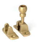 From The Anvil's Satin Brass Mushroom Brighton Fastener