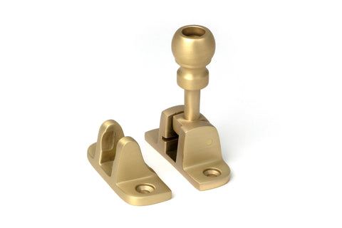 From The Anvil's Satin Brass Mushroom Brighton Fastener