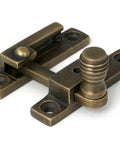From The Anvil's Burnished Brass Prestbury Quadrant Fastener - Narrow
