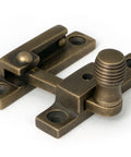 From The Anvil's Burnished Brass Beehive Quadrant Fastener - Narrow