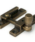 From The Anvil's Burnished Brass Mushroom Quadrant Fastener - Narrow