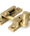 From The Anvil's Satin Brass Beehive Quadrant Fastener - Narrow