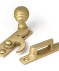 From The Anvil's Satin Brass Beehive Sash Hook Fastener