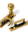 From The Anvil's Aged Brass Sash Hook Fastener
