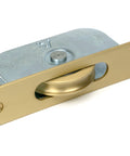 From The Anvil's Satin Brass Radiused Sash Pulley 75kg