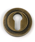 From The Anvil's Burnished Brass Round Euro Escutcheon
