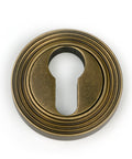 From The Anvil's Burnished Brass Round Euro Escutcheon