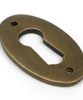 From The Anvil's Burnished Brass Oval Escutcheon