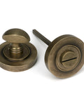 From The Anvil's Burnished Brass Concealed Round Thumbturn Set