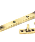 From The Anvil's Aged Brass Monkeytail Stay