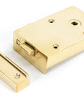 From The Anvil's Polished Brass Bathroom Latch