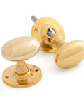 From The Anvil's Polished Brass Oval Mortice/Rim Knob Set