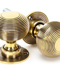 From The Anvil's Aged Brass Heavy Beehive Mortice/Rim Knob Set