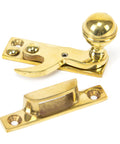 From The Anvil's Polished Brass Prestbury Sash Hook Fastener