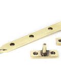 From The Anvil's Aged Brass Reeded Stay