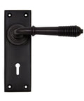 From The Anvil's Aged Bronze Reeded Lever Lock Set