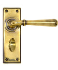 From The Anvil's Aged Brass Newbury Lever Bathroom Set