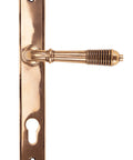 From The Anvil's Polished Bronze Reeded Slimline Lever Espag. Lock Set