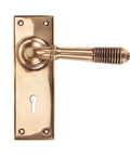 From The Anvil's Polished Bronze Reeded Lever Lock Set