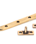 From The Anvil's Polished Bronze Reeded Stay