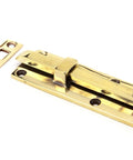 From The Anvil's Aged Brass Universal Bolt