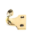 From The Anvil's Aged Brass Sash Lift